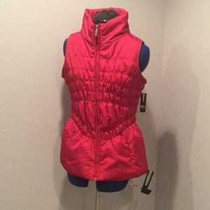 Women’s red zip up vest medium